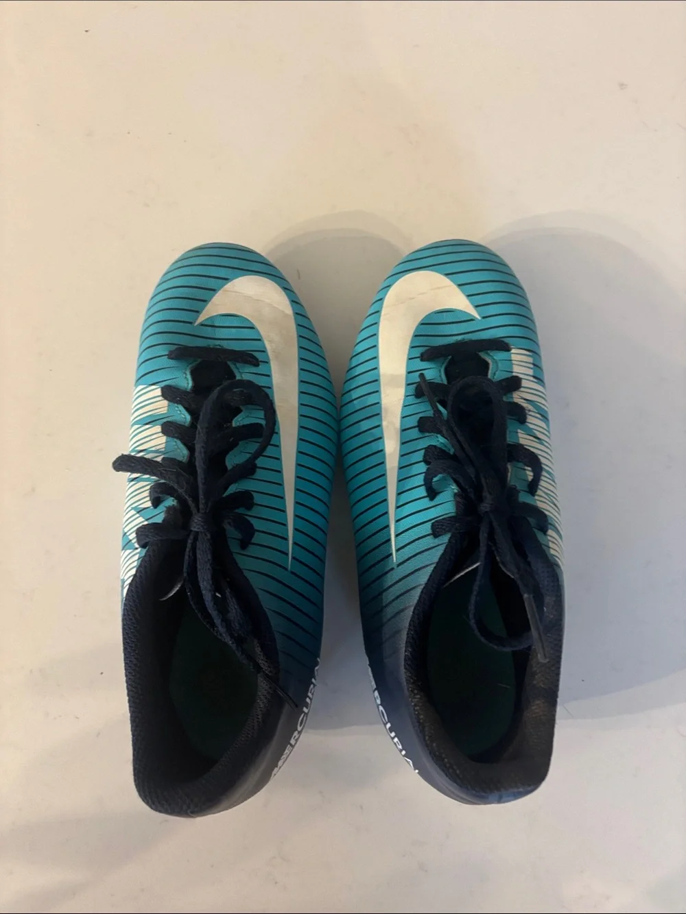 Nike Kids Teal and Navy Striped Soccer Shoes